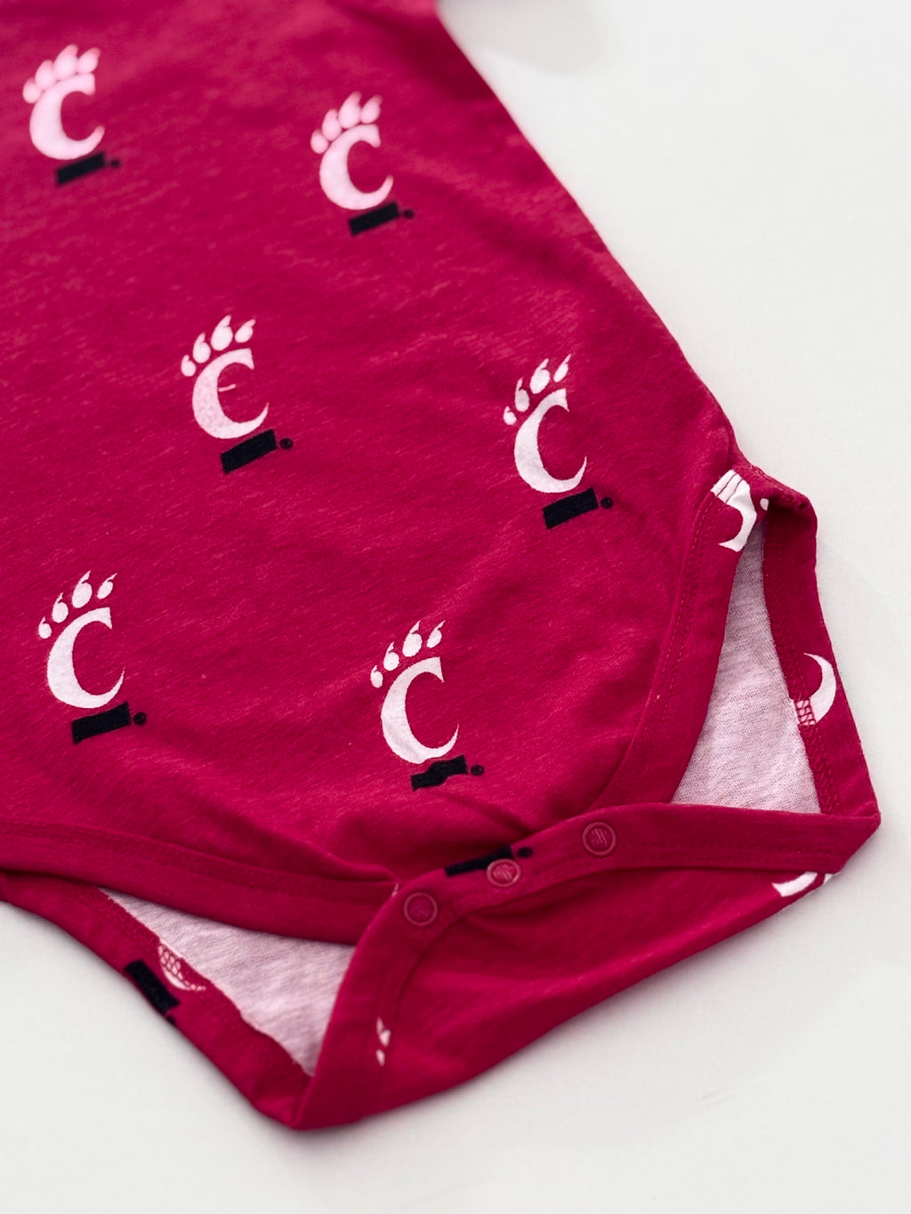 C FOOT RED ONESIE 3-6 months