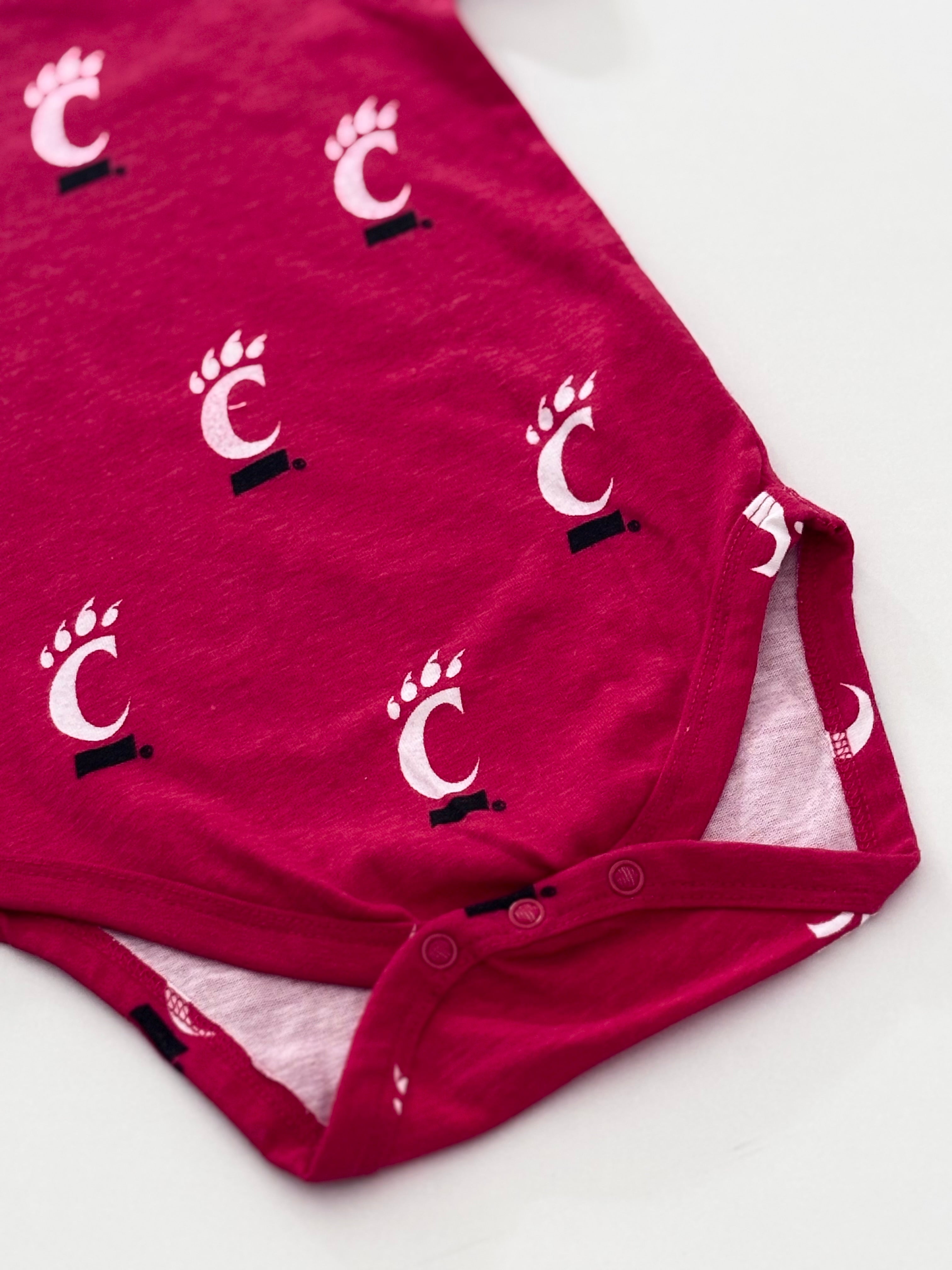 C FOOT RED ONESIE 3-6 months