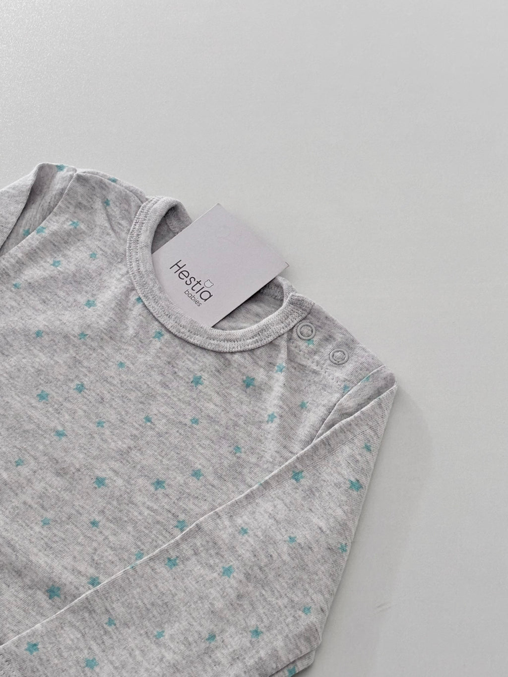 TEAL STAR PRINT ONESIE 3-6months