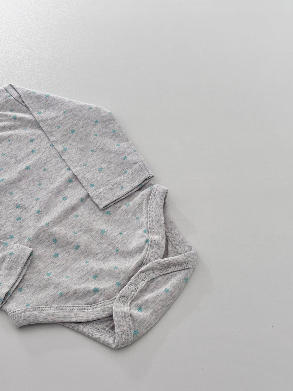 TEAL STAR PRINT ONESIE 3-6months